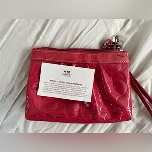 Hot pink coach wristlet
